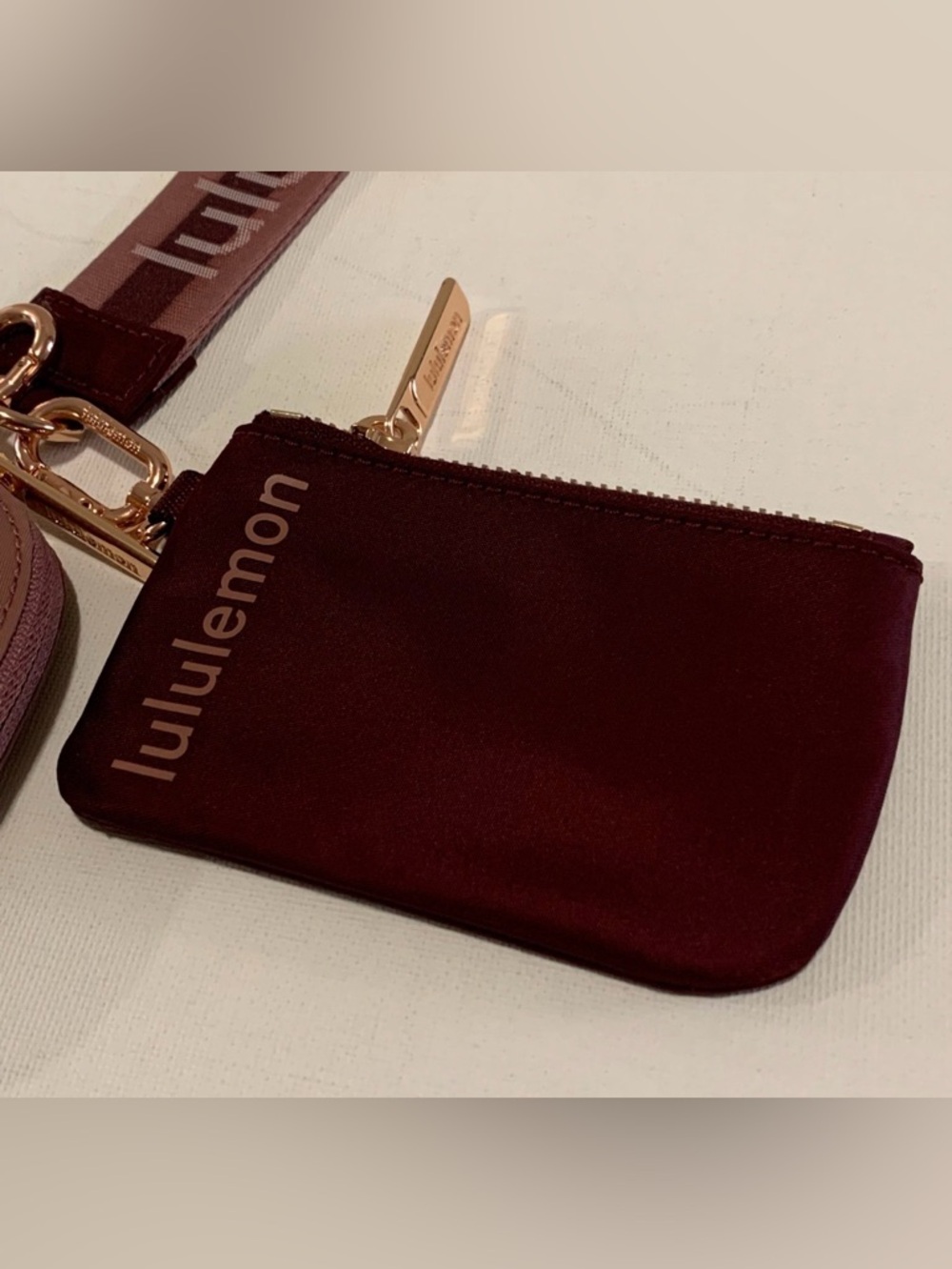 lululemon athletica Dual Pouch Wristlet Wordmark Spiced chai/Garnet/Flush Pink - Picture 2 of 6